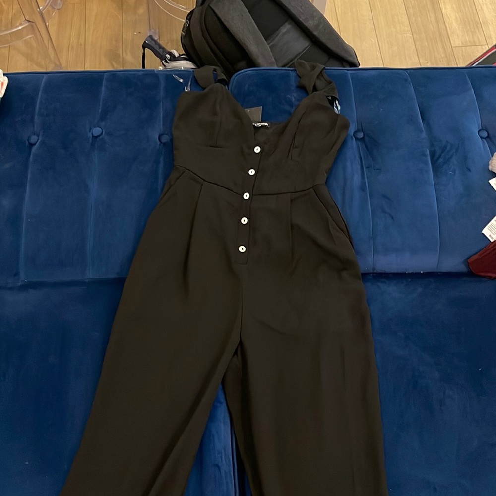 Button front jumpsuit with ruffle straps